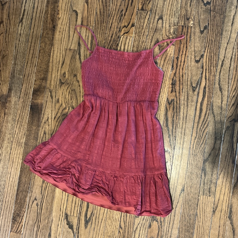 Red Sleeveless Dress with Ruffle Hem